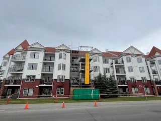 Burnt roof trusses before removal at the Royal Oak NW condo fire restoration