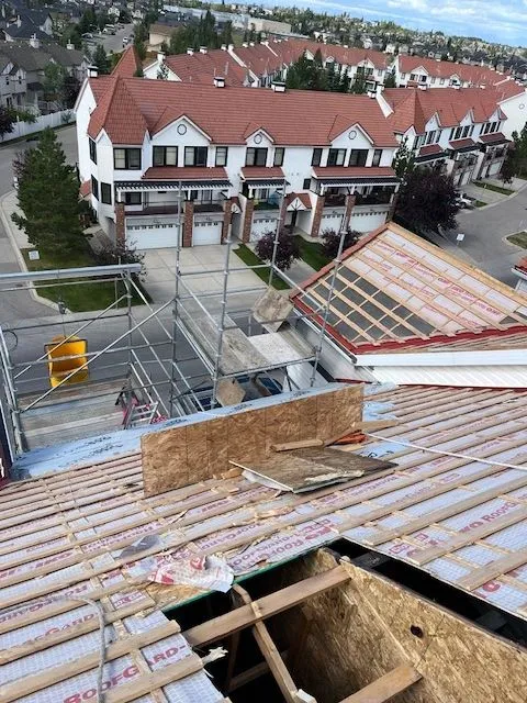 Crew working on the fire-damaged roof structure, Royal Oak NW